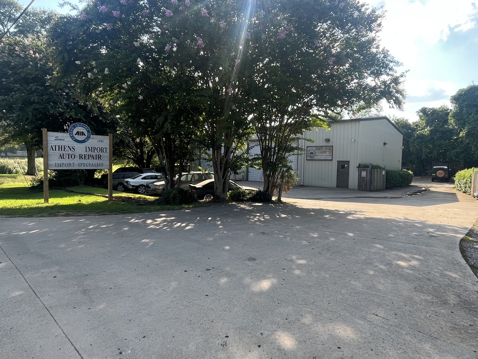 Front entrance and parking lot at Athens Import Auto Repair