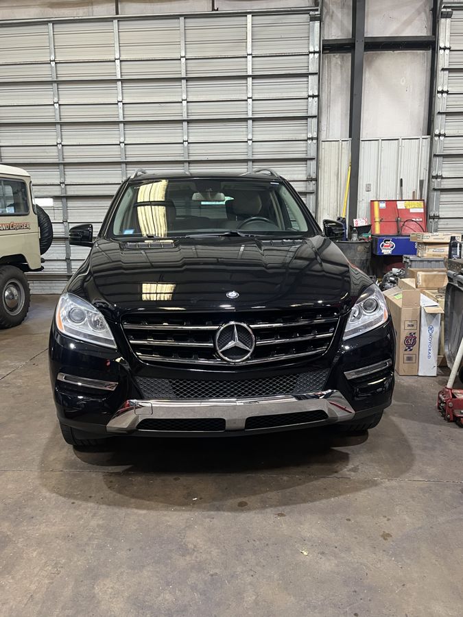 Mercedes-Benz SUV parked in a service bay in Athens, GA